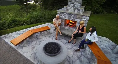 a group of people sitting around a fireplace at Alpine Meadows Resort in Clearwater