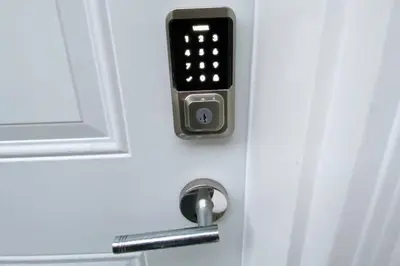 a door with an apple watch attached to it at Two Bedroom Suite Burnaby Metrotown in Burnaby