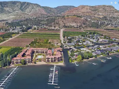 an aerial view of a resort with a marina at Condo at Barona Beach Lakeside Resort in West Kelowna