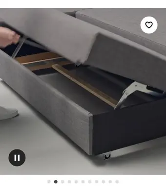 a bed frame with a drawer in a bed room at Marine Drive Station Entire House in Vancouver