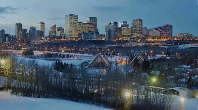 a view of a city in the snow at night at M21 Luxurious, Downtown River Valley Home, Centrally located, Close to everything in Edmonton