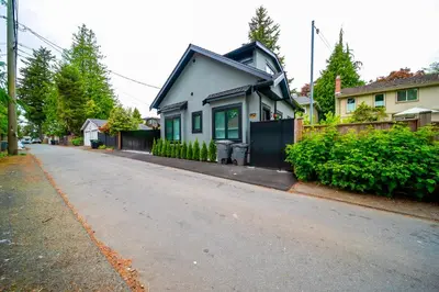 a small house on the side of a street at New laneway house near Airport, World Cup stadium, Downtown, UBC in Vancouver