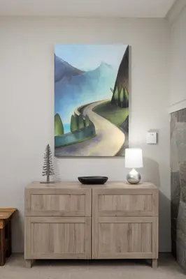 a living room with a painting on the wall at Spacious 3BR Condo in Whistler in Whistler