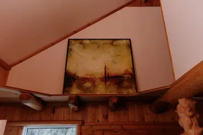 a painting on the ceiling of a room at Rustic Executive Cabin at Beaverfoot in Parson