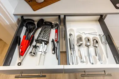 a drawer filled with lots of kitchen utensils at Beautiful Elegant Home Sleeps 10, Free Parking, Central AC in Edmonton
