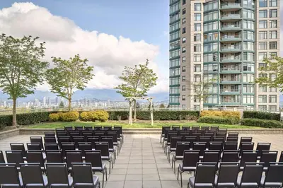 a row of chairs in front of a building at Element by Westin Vancouver Metrotown in Burnaby