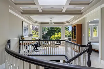 a home with a staircase leading to a living room at Luxurious Multi-Family Home in Vancouver West, 10 Mins Downtown in Vancouver