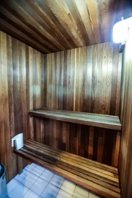 a wooden room with a bench in a bathroom at Chic Artistic Studio Suite Exceptional Luxury with Everything You Need NO need to SHARE Room in Richmond