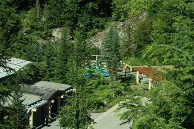an overhead view of a resort in the woods at Whistler Highcamp in Whistler
