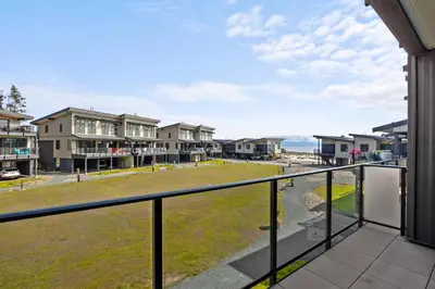 a view from the balcony of a condo at the beach at Ocean View Townhouse #27 in Oyster Bay