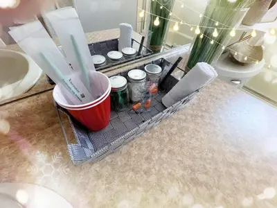 a bathroom counter with jars and utensils on a counter top at Cozy Private suite-Free parking-Netflix-Separate entrance-Self Check in in Richmond
