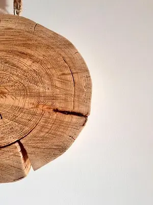 a close up of the end of a piece of wood at Three Peaks Getaway Jacuzzi Suite - sleeps 4 in Canmore