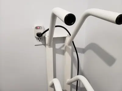 a camera is attached to a white pole at Upscale Modern Apartment in Whistler