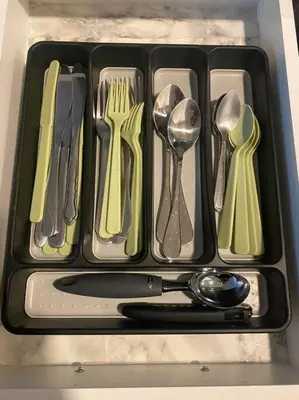 a plastic tray with utensils in a drawer at Pebbles' Cozy 2Bed Basement Suite - near Downtown in Edmonton