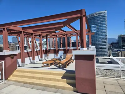 a rooftop deck with stairs and benches on a building at New York Style Loft in Downtown Vancouver-Ideal for World Cup 2026, Sleeps 4 in Vancouver