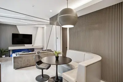 a living room with a couch and a table at Designer 2BR in Downtown Steps from Sunset Beach in Vancouver