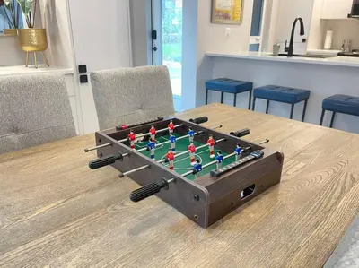 a chess board on a table in a room at ENTIRE Sunrise Resort Townhome in Parksville in Parksville