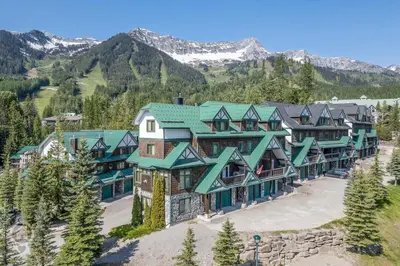 an aerial view of a lodge in the mountains at Cedar Ridge Estates by StayIn in Fernie