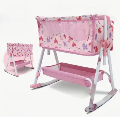 a pink high chair and a pink baby swing at Scorpio House Langley - Semi-basement Suite in Langley