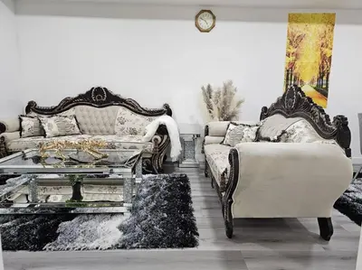 a living room with a couch and a coffee table at Comfort Guest Suite NE Calgary - Near Airport in Calgary