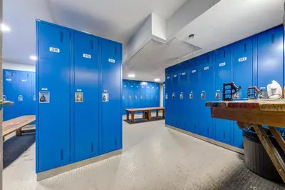 a blue locker room with blue lockers at Greystone Lodge 202 Ski-in Out in Whistler