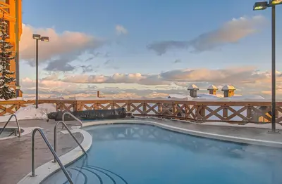 a swimming pool on top of a building at Stonegate Resort Unit B303 in Big White