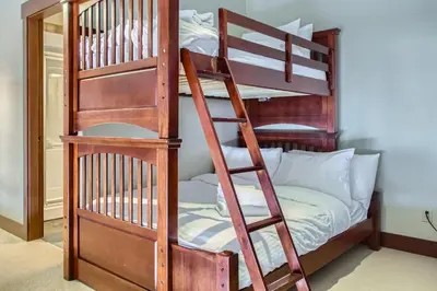 a couple of bunk beds in a room at Stonegate Resort Unit A402 in Big White