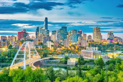 a view of a city skyline with a bridge at Chic & Cozy Loft near Rogers Place, LRT, Jasper Ave in Edmonton
