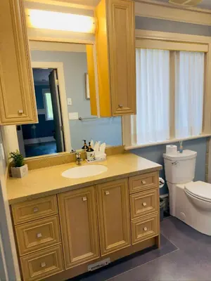a bathroom with a sink and a toilet at Unitrip King bed in Richmond