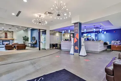 a lobby of a store with couches and chairs at Luxury Rockies Retreat 1BR with Views in Canmore