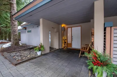a front porch of a house with a patio at 31 GlenEagle in Whistler