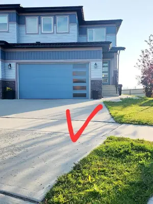 a red arrow in front of a house at Luxury Cozy Basement Suite in Leduc