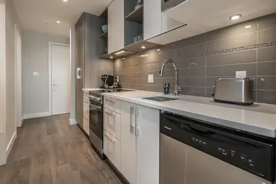 a kitchen with a sink and a counter top at Be The Lively Cityzen In Cityzen in Victoria