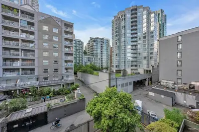 an aerial view of a city with tall buildings at Lovely 2-Bedrooms Downtown suite Free Parking in Vancouver
