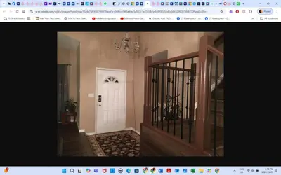 a picture of a hallway with a white door at Master Bedroom private bathroom 23 minutes airport in Edmonton