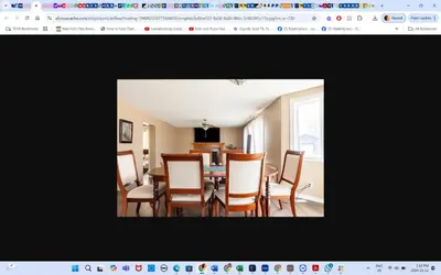 a dining room with a table and chairs at Main floor room 4, 22 minute from airport in Edmonton
