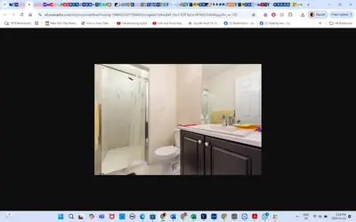a bathroom with a shower and a toilet and a sink at Main floor room 4, 22 minute from airport in Edmonton