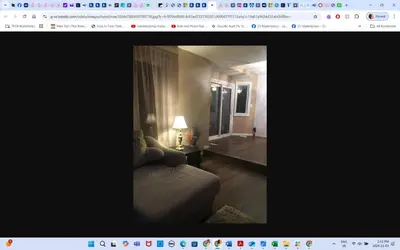 a picture of a living room with a couch in a room at Room # 3 Sleep 4 Arrangement in Edmonton