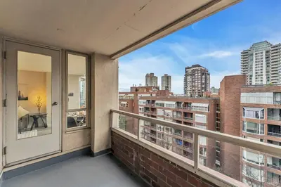 a balcony with a view of a city at Beautiful City Two Beds Suite with Free Parking in Vancouver