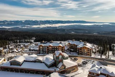 an aerial view of a resort in the snow at Winter Escape On Perfection - Ski In Out, Pool & Hot Tub in Big White