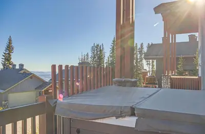 a patio with a cover on top of a fence at Moonshine Crescent 365 by Okanagan Premier in Big White