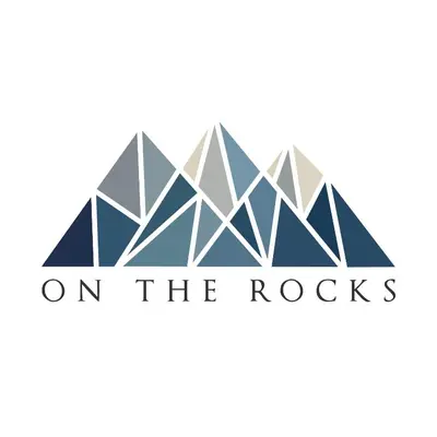 a logo for the rocks on the rocks at Family Gateway Outdoor Pool & Hot Tub Experience in Canmore