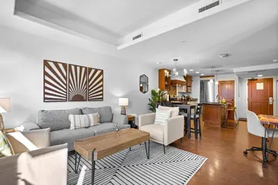 a living room with a couch and a table at Quiet Retreat for Couples in Canmore