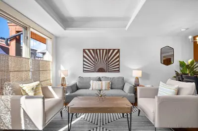 a living room with two couches and a coffee table at Quiet Retreat for Couples in Canmore