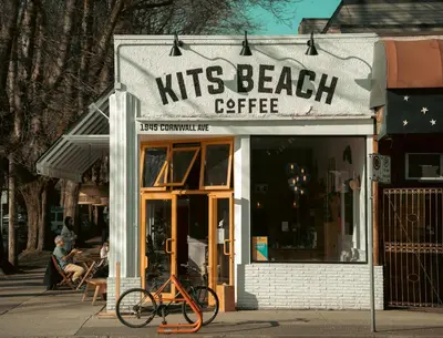 a bike parked in front of a nuts beach cafe at City Retreat With Views in the Heart of Downtown in Vancouver