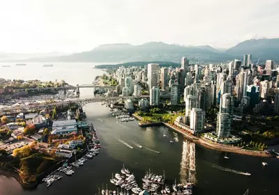 an aerial view of a city with a harbor at City Retreat With Views in the Heart of Downtown in Vancouver