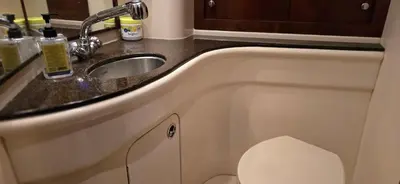 a bathroom with a sink and a toilet at Fly Knots in Vancouver