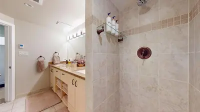 a bathroom with a shower and a sink at Whistler village central stay! in Whistler