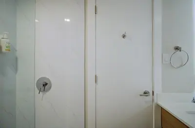 a shower with a glass door in a bathroom at Baymont by Wyndham Gold River in Gold River