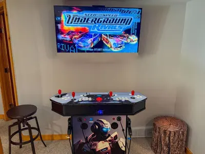 a video game console in a room with a video gamehibitionhibition at Alders Chalet by Fernie Central Reservations in Fernie
